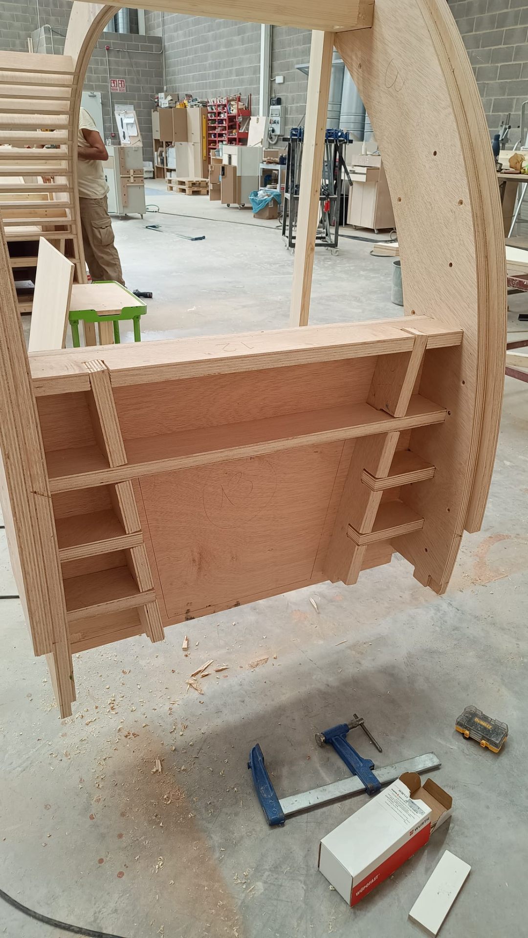 CNC-cut plywood components staged for assembly