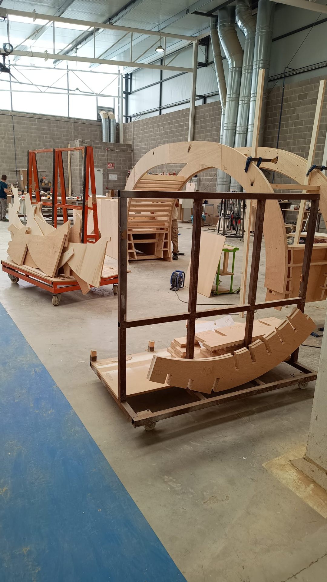 Full-scale plywood mockup assembled on the workshop floor
