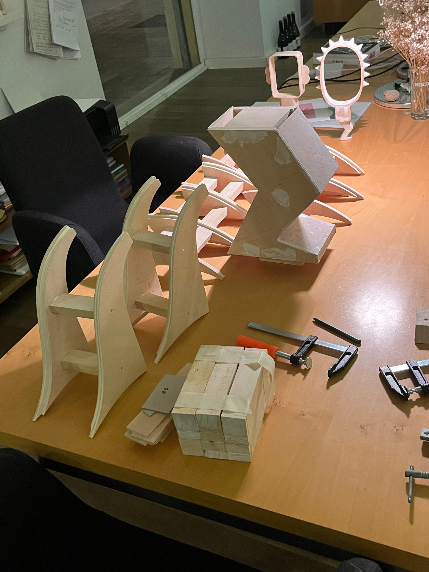 Tabletop study models and early concept mirror forms