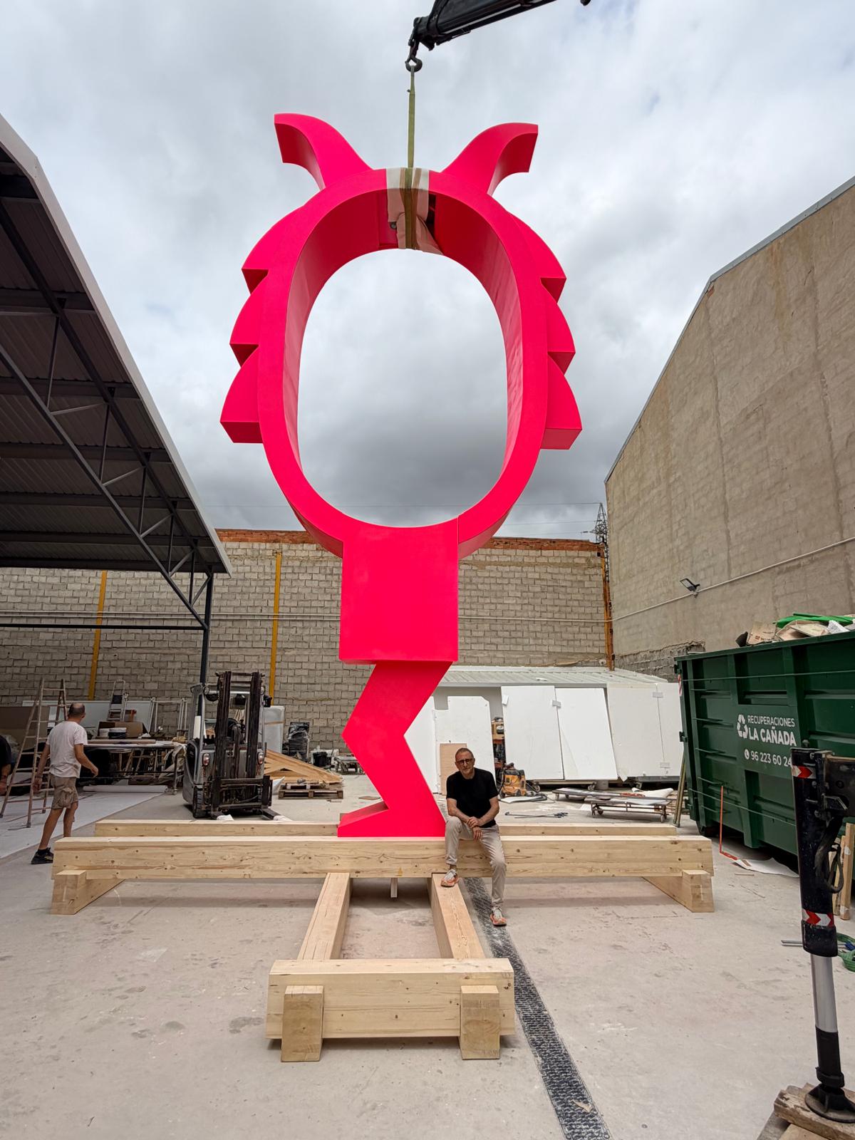 Dimoni totem rigged on the crane in the workshop yard